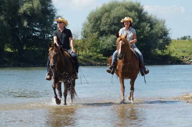 two riders in the Danube, Bavaria