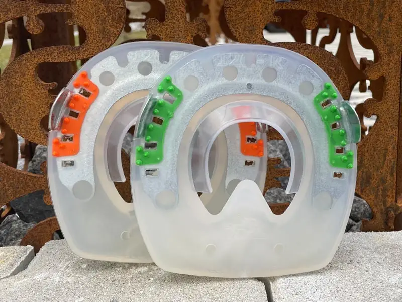 Alternative horseshoes with softer and harder urethane inserts for improved stability on the hoof