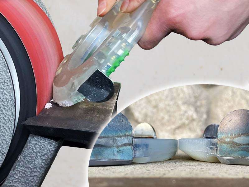 a farrier modifies a horseshoe using a belt sander to add a toe rocker