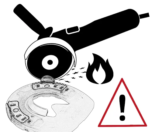 A Duplo horseshoe with its side clip being ground using an angle grinder. Warning: Sparks fly and may ignite a flame.