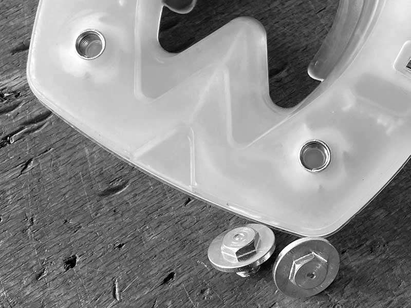 Detailed view of the cleat holes in the plastic cover of the alternative horseshoe and cleats