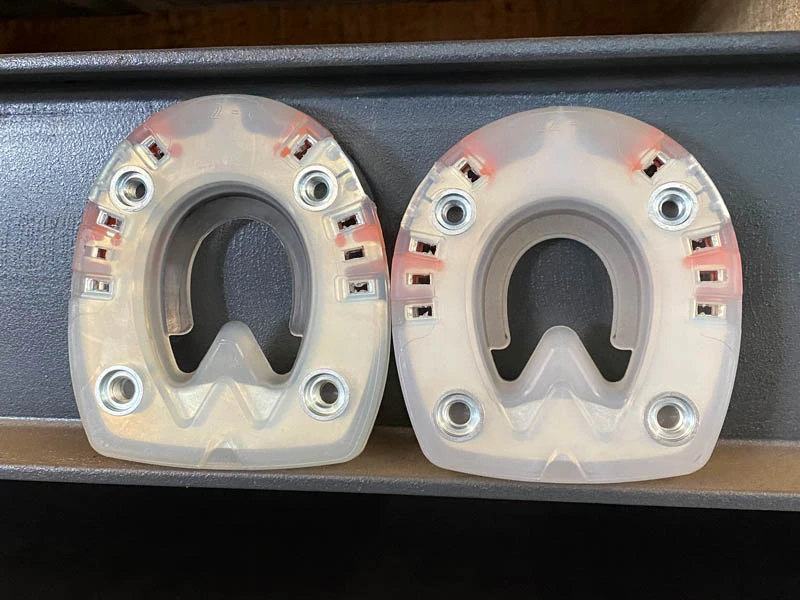 Straight Bar Horseshoes with Plastic Coating and Stud Holes for Show Jumping Horses in Round and Oval Shapes