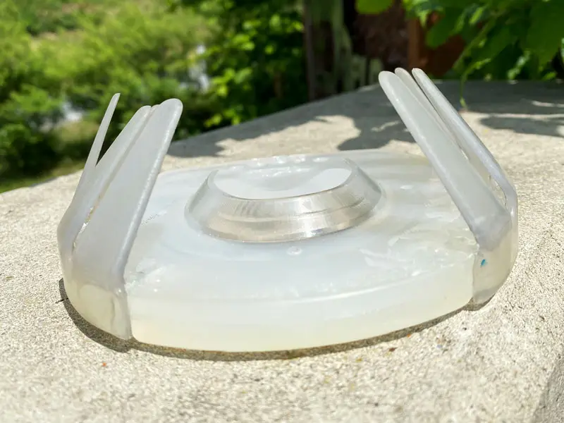 Classic plastic shoe without a metal core with a split adhesive collar, leaving the toe area free of tabs.