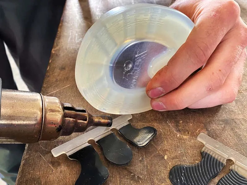 plastic welding of a urethane pony horseshoe and glue-on tab using a hot air gun with a reduction nozzle.
