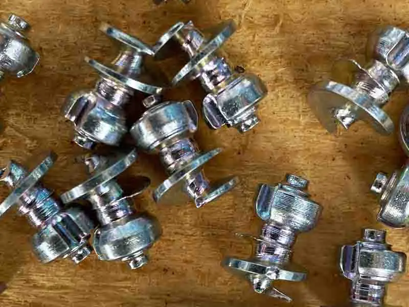 Quick Studs, also known as Spikes — comparable to tungsten carbide pins in combination with a hoof protection with plastic coating