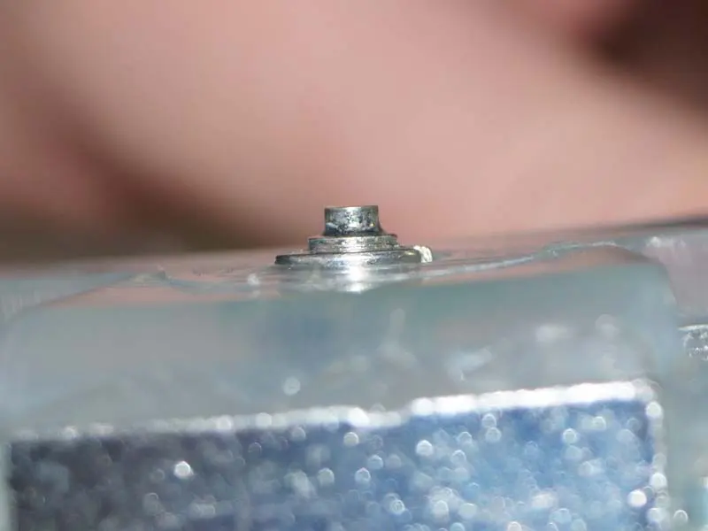 side view of a quick stud to add additional grip to your composite horseshoe