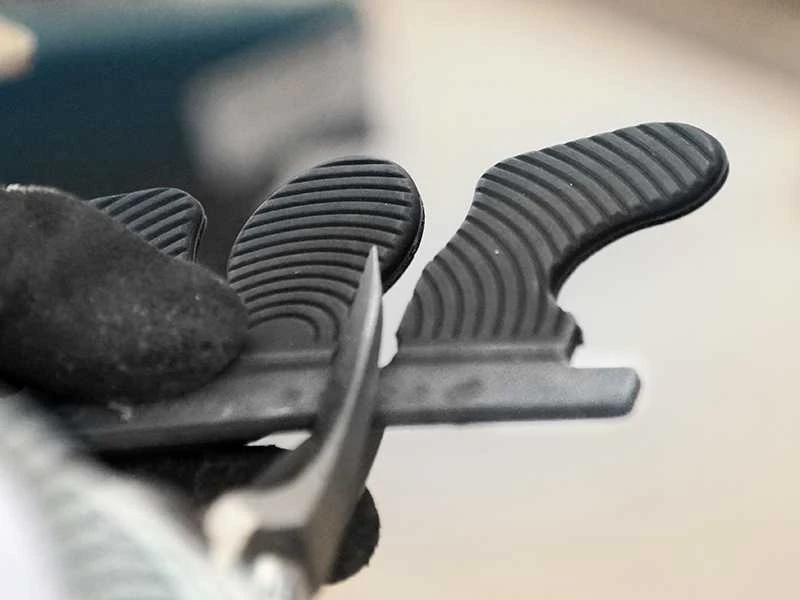 cutting through a Wolf Busch&reg; glue tab